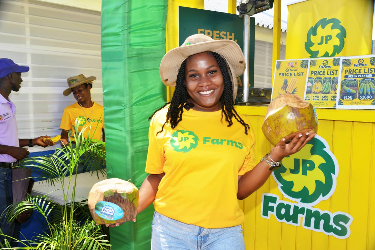 Lindsay smiles for the camera while representing JP Farms at the 2026 Denbigh Agriculture Show.