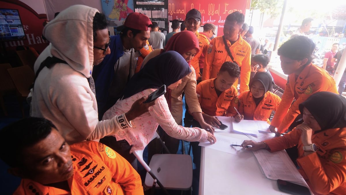 Search underway for about 130 people after Indonesian ferry overturns