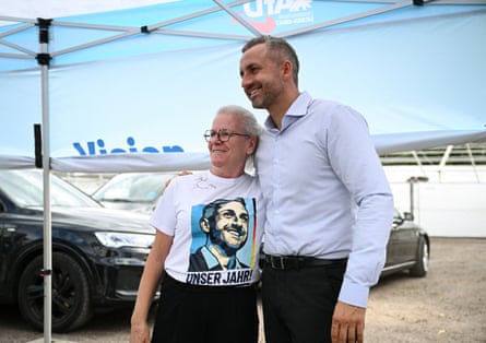 The AfD’s Ulrich Siegmund poses for pictures with a supporter as he campaigns in Saxony-Anhalt, 4 September 2026.
