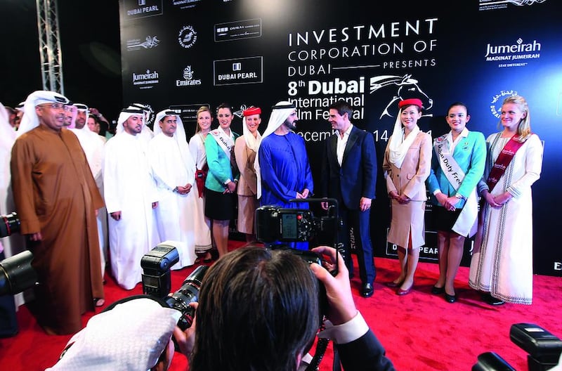 Sheikh Mohammed bin Rashid, Vice President of the UAE and Ruler of Dubai, stands with Tom Cruise in 2011. Pawan Singh / The National