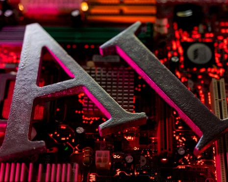Large metal letters spelling "AI" rest on a computer motherboard lit with red lights