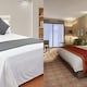 Why do hotel rooms almost always have white bedsheets?