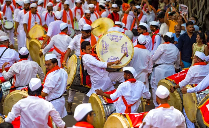 Pune: Devotees beat drums during the traditional Manache Ganpati procession marking the beginning of Ganeshotsav, in Pune, Maharashtra, on Monday, September 14, 2026.