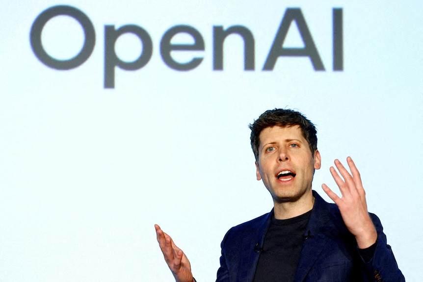 OpenAI CEO Sam Altman, dressed in a black suit, attends an event in Tokyo