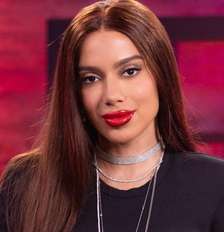 Anitta se destacou como conselheira dos cantores e não poupou nem a Globo de críticas Foto: Divulgação/TV Globo