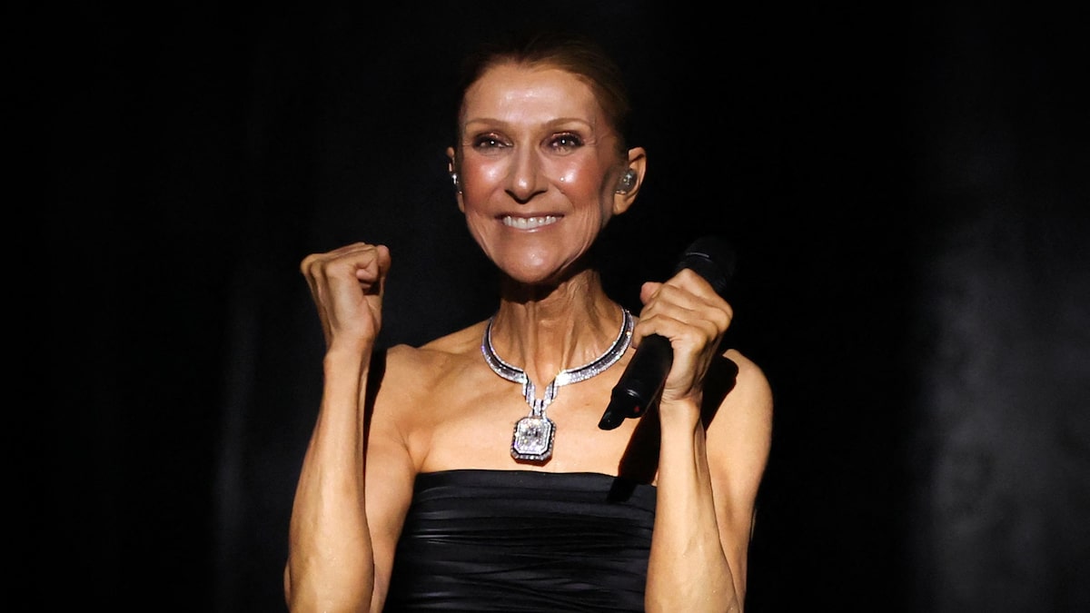 Céline Dion fica descalça e sobe em capô de carro de luxo para cantar e dançar com fãs