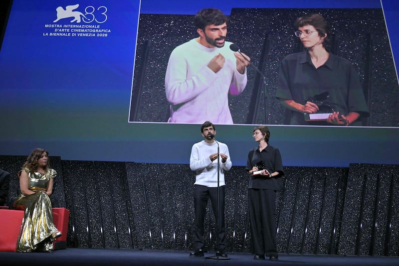 Kaouther Ben Hania, left, watches as directors Yuval Abraham and Rachel Szor receive the Special Jury Prize for Naza. AFP