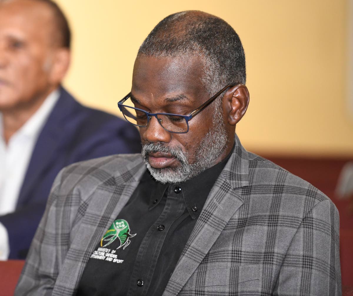 Denzil Thorpe, permanent secretary in the Ministry of Culture, Gender, Entertainment and Sports, at the funeral.