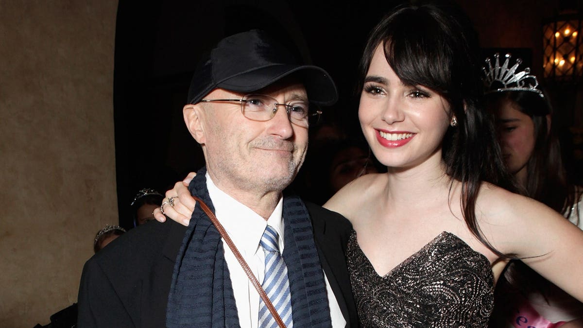 Lily Collins and Phil Collins at the Los Angeles premiere of